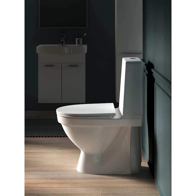 Toalettstol Laufen Kompas 825151 Rimless Förhöjd med Dolt S-lås för Limning inkl Mjuksits